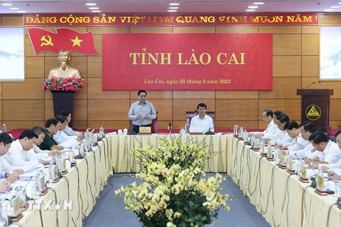 Thủ tướng Phạm Minh Chính chủ trì làm việc với lãnh đạo chủ chốt tỉnh Lào Cai. (Ảnh: Dương Giang/TTXVN)