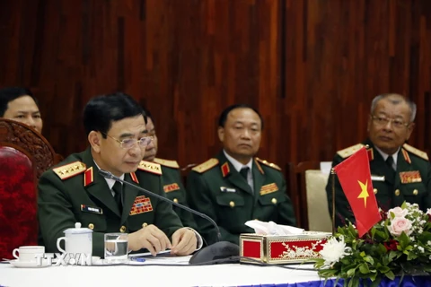 Bộ trưởng Bộ Quốc phòng Phan Văn Giang tại cuộc gặp thường niên giữa Bộ trưởng Bộ Quốc phòng ba nước Việt Nam-Lào-Campuchia. (Ảnh: Phạm Kiên/TTXVN)