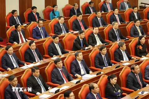 Các đại biểu dự bế mạc Hội nghị lần thứ 6 Ban Chấp hành Trung ương Đảng. (Ảnh: Trí Dũng/TTXVN)