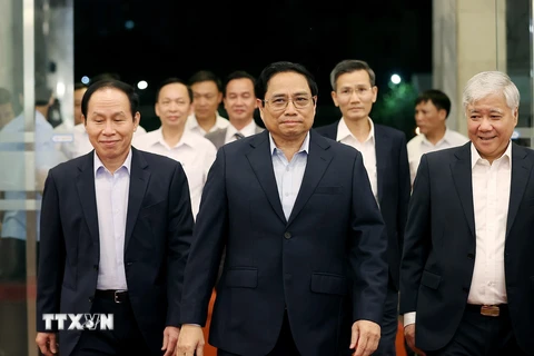 Thủ tướng Phạm Minh Chính đến dự chương trình 'Cả nước chung tay vì người nghèo' năm 2022. (Ảnh: Dương Giang/TTXVN)