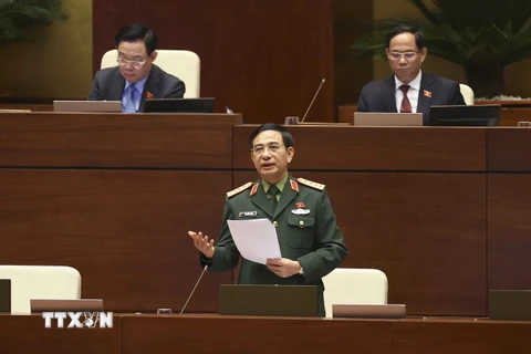 Bộ trưởng Bộ Quốc phòng Phan Văn Giang phát biểu giải trình, làm rõ một số vấn đề đại biểu Quốc hội nêu. (Ảnh: Doãn Tấn/TTXVN)