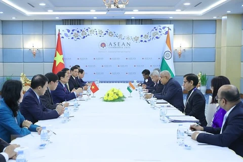 Thủ tướng Phạm Minh Chính gặp Phó Tổng thống Ấn Độ Jagdeep Dhankhar. (Ảnh: Dương Giang/TTXVN)