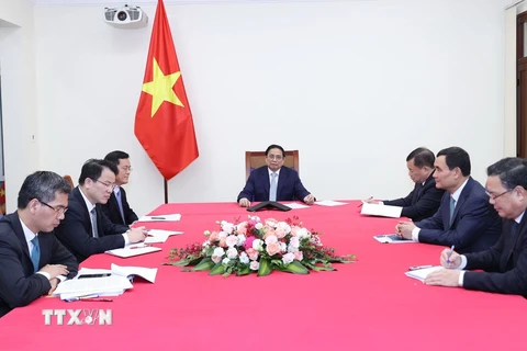 Thủ tướng Phạm Minh Chính điện đàm với Thủ tướng Cộng hòa Pháp Elisabeth Borne. (Ảnh: Dương Giang/TTXVN)