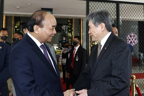 Chủ tịch nước Nguyễn Xuân Phúc với Tổng Thư ký ASEAN Lim Jock Hoi. (Ảnh: Thống Nhất/TTXVN)