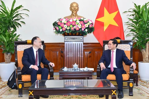 Bộ trưởng Ngoại giao Bùi Thanh Sơn tiếp ông Nông Dung, Trợ lý Bộ trưởng Ngoại giao Trung Quốc. (Nguồn: Thế giới và Việt Nam)