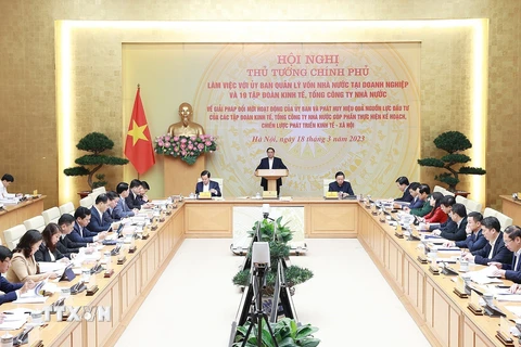 Thủ tướng Phạm Minh Chính chủ trì làm việc với Ủy ban Quản lý vốn nhà nước tại doanh nghiệp và các tập đoàn kinh tế, tổng công ty nhà nước. (Ảnh: Dương Giang/TTXVN)