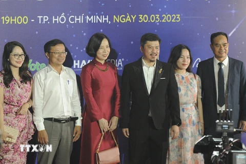 Tổng Giám đốc Thông tấn xã Việt Nam Vũ Việt Trang và các đại biểu tham dự chương trình. (Ảnh: Hồng Giang/TTXVN)