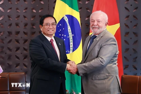 Thủ tướng Phạm Minh Chính và Tổng thống Brazil Luiz Inácio Lula da Silva. (Ảnh: Dương Giang/TTXVN)