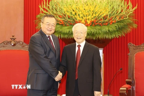 Tổng Bí thư Nguyễn Phú Trọng tiếp Trưởng Ban Liên lạc Đối ngoại Trung ương Đảng Cộng sản Trung Quốc Lưu Kiến Siêu. (Ảnh: Trí Dũng/TTXVN)