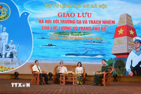 Các đại biểu tham gia giao lưu. (Ảnh: Nguyễn Cúc/TTXVN)