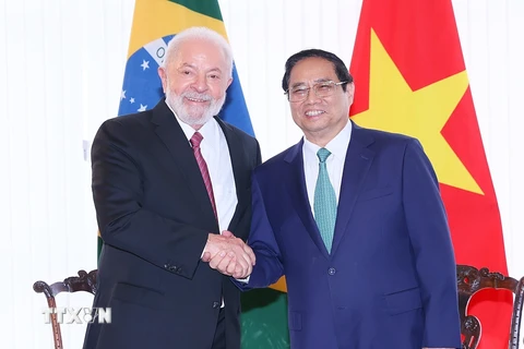 Thủ tướng Phạm Minh Chính với Tổng thống Brazil Lula da Silva. (Ảnh: Dương Giang/TTXVN)