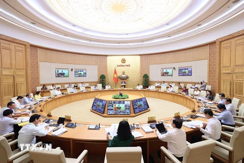 Thủ tướng Phạm Minh Chính chủ trì Phiên họp Chính phủ thường kỳ tháng 9 trực tuyến đến điểm cầu 63 địa phương. (Ảnh: Dương Giang/TTXVN)