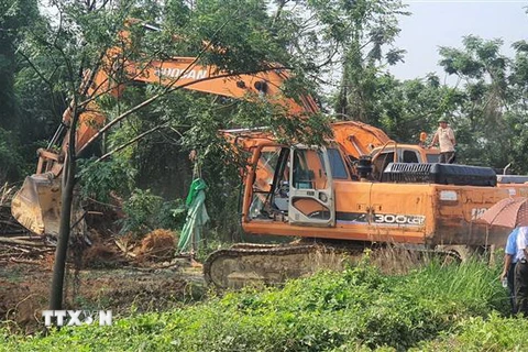 Cưỡng chế, giải phóng mặt bằng Dự án Khu Đô thị Mới Nam Vĩnh Yên. (Ảnh: Nguyễn Trọng Lịch/TTXVN)