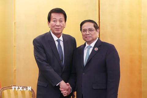 Thủ tướng Phạm Minh Chính tiếp nguyên Đại sứ Đặc biệt Việt Nam-Nhật Bản Sugi Ryotaro. (Ảnh: Dương Giang/TTXVN)