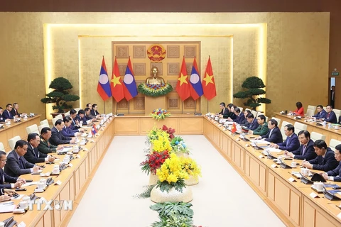 Thủ tướng Phạm Minh Chính hội đàm với Thủ tướng Lào Sonexay Siphandone. (Ảnh: Dương Giang/TTXVN)
