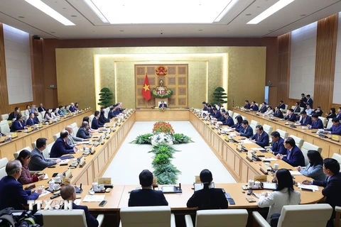 Thủ tướng Phạm Minh Chính tiếp Đoàn doanh nghiệp của Hội đồng Kinh doanh Hoa Kỳ-ASEAN. (Ảnh: Dương Giang/TTXVN)