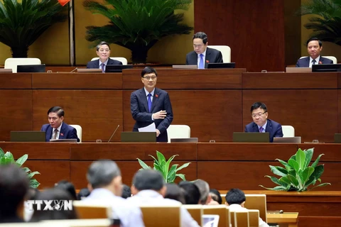 Chủ nhiệm Ủy ban Kinh tế của Quốc hội Vũ Hồng Thanh giải trình, làm rõ một số vẫn đề đại biểu Quốc hội nêu. (Ảnh: An Đăng/TTXVN)