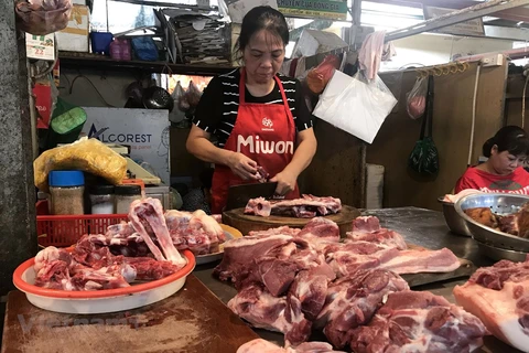 Các sản phẩm thịt lợn duy trì mức giá ổn định so với đợt lễ Rằm tháng Giêng. (Ảnh: Việt Anh/Vietnam+)
