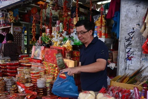 Bánh chưng - mặt hàng bán rất chạy tại chợ của người Việt ở nước ngoài. (Ảnh: Võ Giang/Vietnam+)