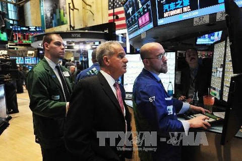 Tại sàn giao dịch cổ phiếu New York, Mỹ. (Ảnh: AFP/TTXVN)