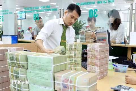 Chín tháng, Vietcombank đạt 99% kế hoạch doanh thu 2014