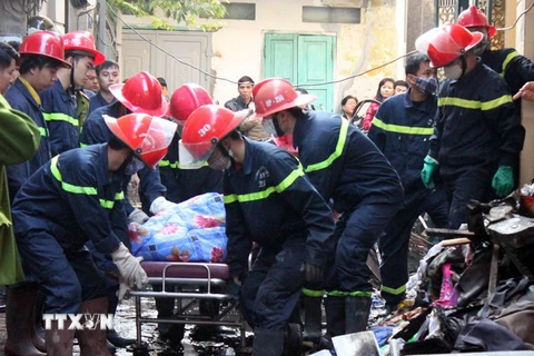 [Photo] Cháy tiệm may, 6 người trong cùng một gia đình tử vong