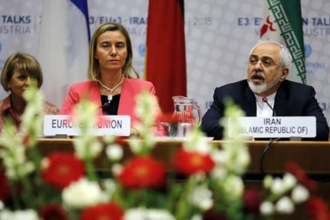 Bà Federica Mogherini và ông Mohammad Javad Zarif trong cuộc gặp ngày 14/7 tại Áo. (Nguồn: AFP)