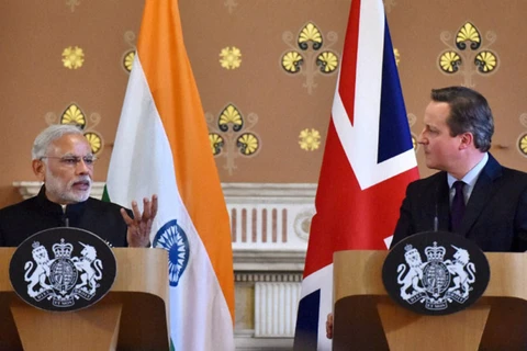 Thủ tướng Ấn Độ Narendra Modi và người đồng cấp Anh David Cameron. (Nguồn: PTI)
