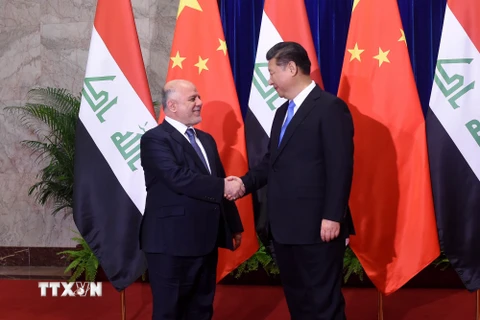 Thủ tướng Iraq Haider al-Abadi và Chủ tịch Trung Quốc Tập Cận Bình. (Nguồn: AFP/TTXVN)