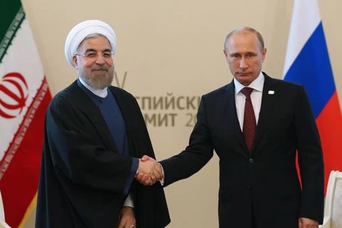 Tổng thống Nga Vladimir Putin và người đồng cấp Iran Hassan Rouhani trong một cuộc gặp. (Nguồn: theiranproject.com)