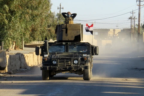 Binh sỹ chống khủng bố Iraq làm nhiệm vụ tại khu vực ngoại ô Ramada ngày 13/1. (Nguồn: AFP/TTXVN)