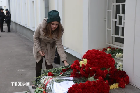 Tưởng niệm các nạn nhân thiệt mạng trong vụ tấn công tại Brussels ngày 22/3. (Nguồn: THX/TTXVN)