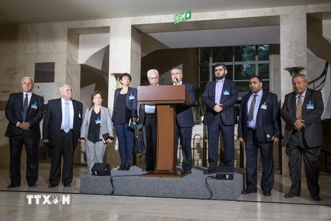 Đại diện cấp cao các nhóm đối lập Syria trong cuộc họp báo tại Geneva (Thụy Sĩ) ngày 13/4. (Nguồn: THX/TTXVN)