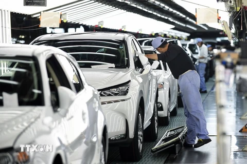 Dây chuyền sản xuất ô tô Toyota tại nhà máy Miyata ở Miyawaka, tỉnh Fukuoka, Nhật Bản . (Nguồn: AFP/TTXVN)