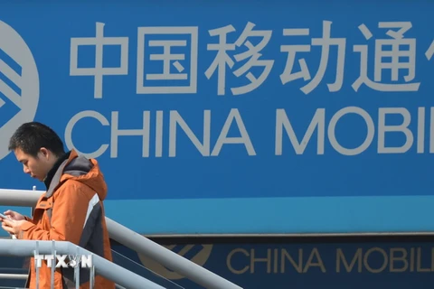 Logo của China Mobile tại thành phố Thượng Hải, Trung Quốc. (Nguồn: AFP/TTXVN)
