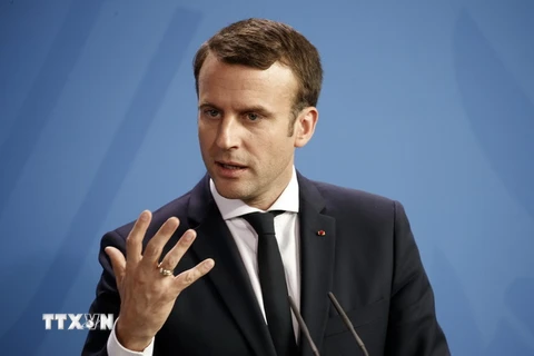 Tổng thống Pháp Emmanuel Macron tại cuộc họp báo ở Berlin, Đức. (Nguồn: EPA/TTXVN)