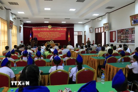 Ông Saysomphone Phomvihane, Ủy viên Bộ Chính trị, Chủ tịch Mặt trận Lào Xây dựng Đất nước tại buổi nói chuyện. (Ảnh: Phạm Kiên)