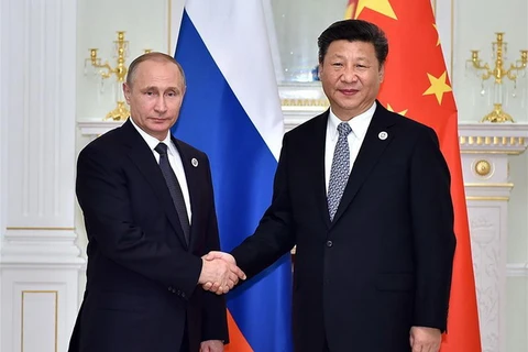 Tổng thống Nga Vladimir Putin và Chủ tịch Tập Cận Bình trong một cuộc gặp năm 2016. (Nguồn: Xinhua)