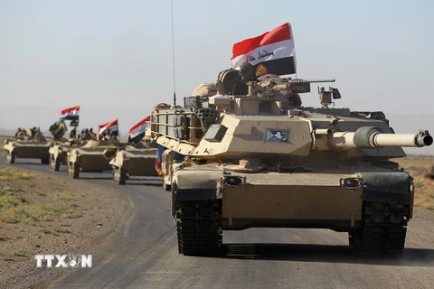 Các lực lượng Iraq trong chiến dịch chống IS tại Hawija ngày 4/10. (Nguồn: AFP/TTXVN)