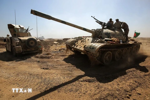 Các lực lượng Iraq trong chiến dịch chống khủng bố tại khu vực giữa hai thành phống Hawija và Kirkuk ngày 6/10. (Nguồn: AFP/TTXVN)