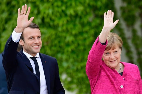 Tổng thống Pháp Emmanuel Macron và Thủ tướng Đức Angela Merkel. (Nguồn: AFP)