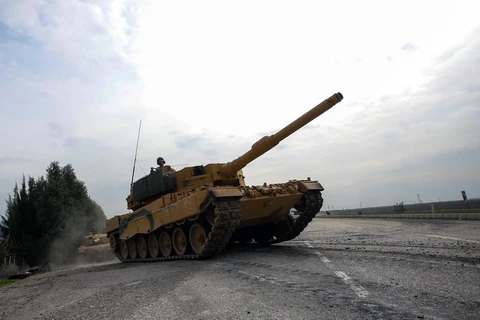  Xe quân sự từ Hatay, Thổ Nhĩ kỳ chuẩn bị tiến vào khu vực Afrin, Syria ngày 21/1. (Nguồn: THX/TTXVN)