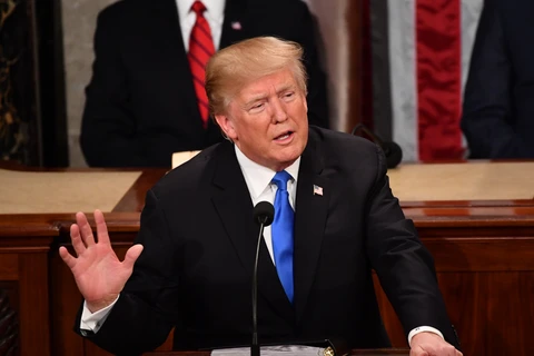 Tổng thống Mỹ Donald Trump đọc Thông điệp Liên bang 2018 trước lưỡng viện Quốc hội và các thành viên Chính phủ. (Nguồn: AFP/TTXVN)
