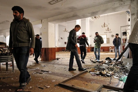 Hiện trường một vụ đánh bom tại Benghazi, Libya ngày 9/2. (Nguồn: AFP/TTXVN)