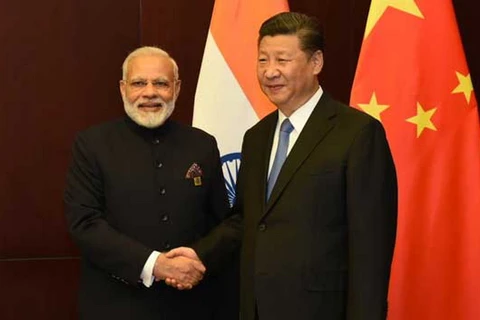Chủ tịch Trung Quốc Tập Cận Bình (phải) và Thủ tướng Ấn Độ Narendra Modi. (Nguồn: ndtv.com)