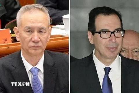 Phó Thủ tướng Trung Quốc Lưu Hạc (trái) và Bộ trưởng Tài chính Mỹ Steven Mnuchin. (Nguồn: Kyodo/TTXVN)