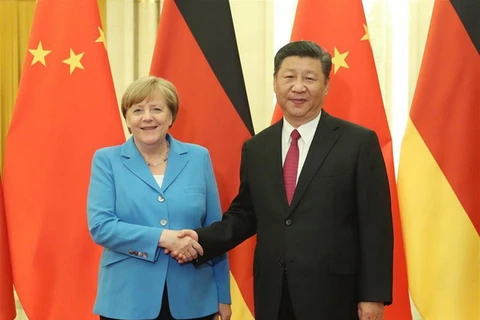 Chủ tịch Trung Quốc Tập Cận Bình tiếp Thủ tướng Đức Angela Merkel. (Nguồn: Xinhua)