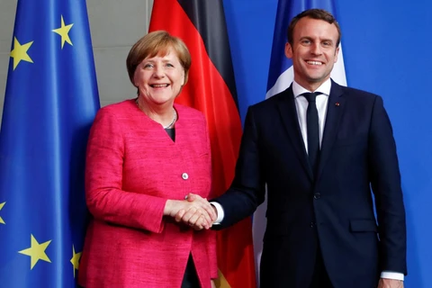 Thủ tướng Đức Angela Merkel và Tổng thống Pháp Emmanuel Macron. (Nguồn: Reuters)