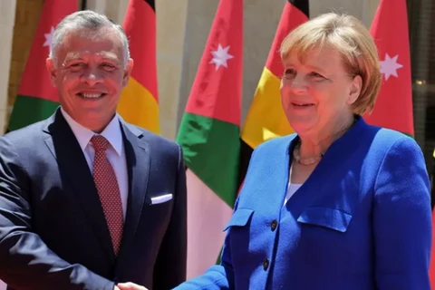 Quốc vương Jordan và Thủ tướng Đức Angela Merkel. (Nguồn: AFP) 