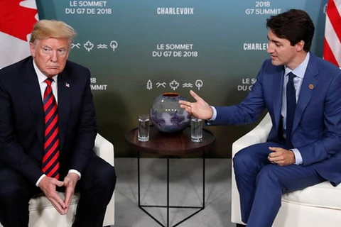 Thủ tướng Canada Justin Trudeau và Tổng thống Mỹ Donald Trump gặp nhau bên lề hội nghị G7 hồi tháng Sáu. (Nguồn: Reuters)